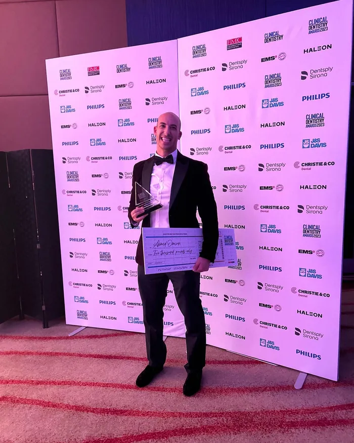Dr Omran receiving the Best Young Orthodontist South 2023 award